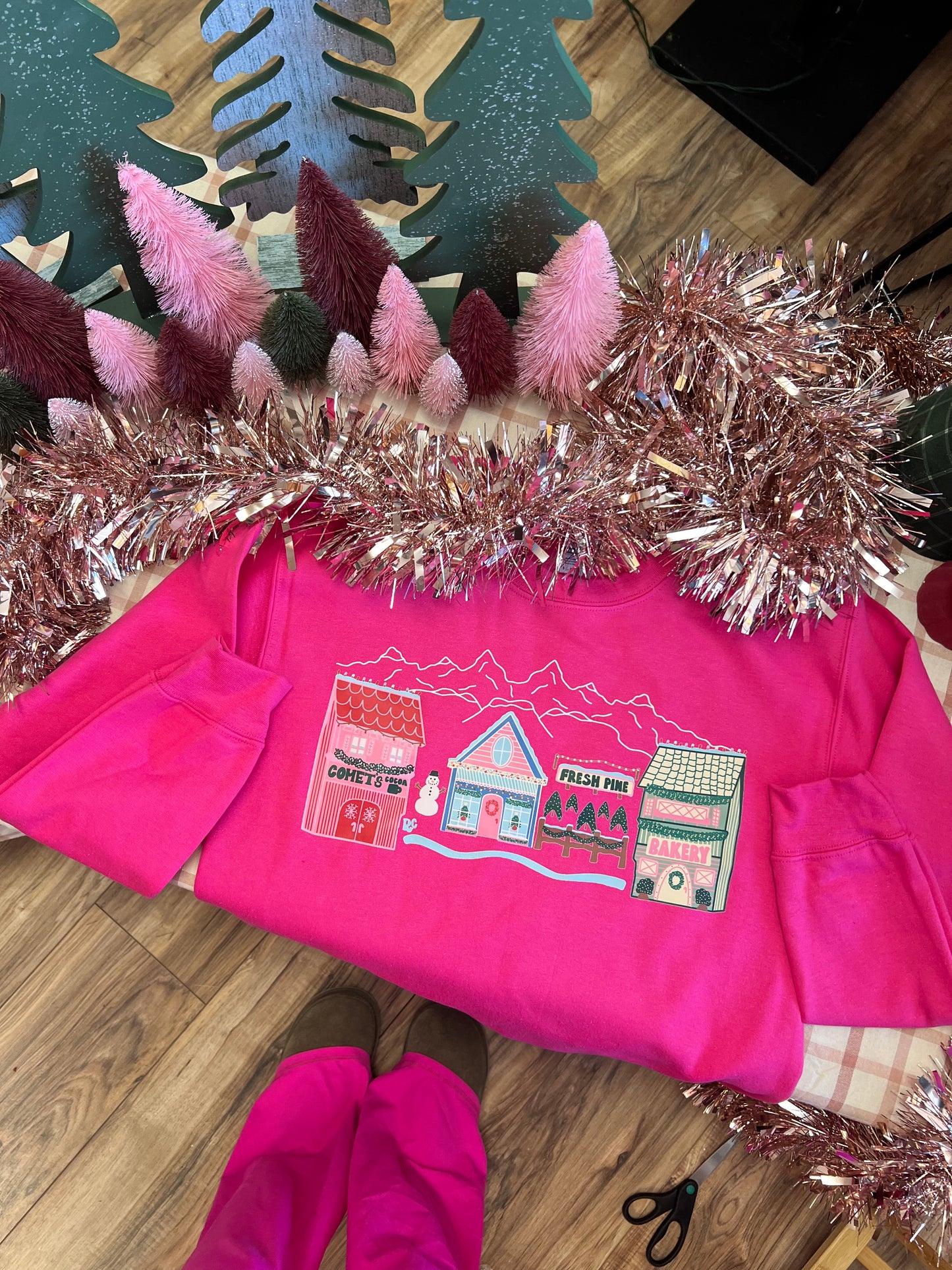 Comet's Christmas Village Sweatshirt Pink