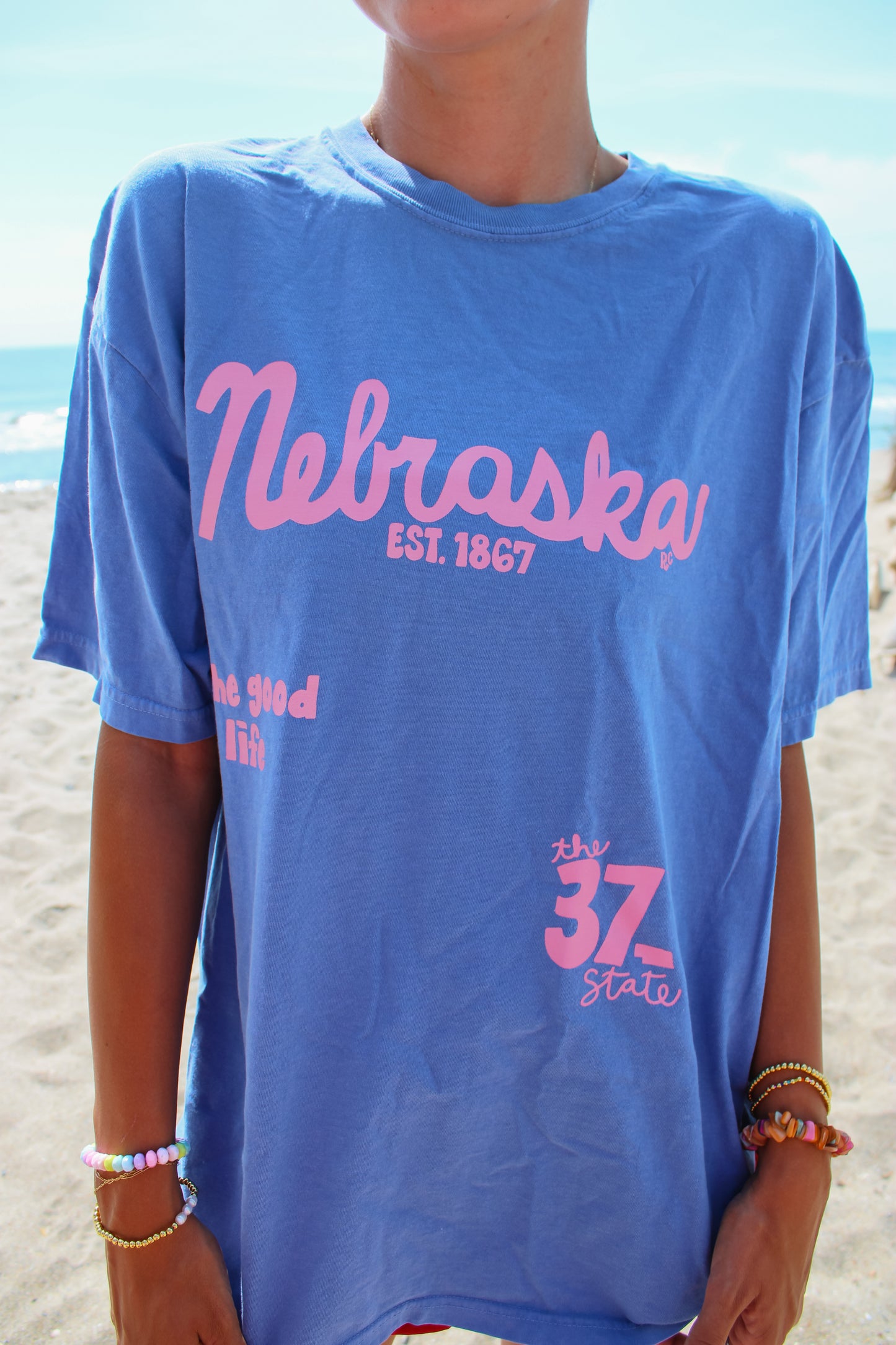 Nebraska 37 Flo Blue Tee
