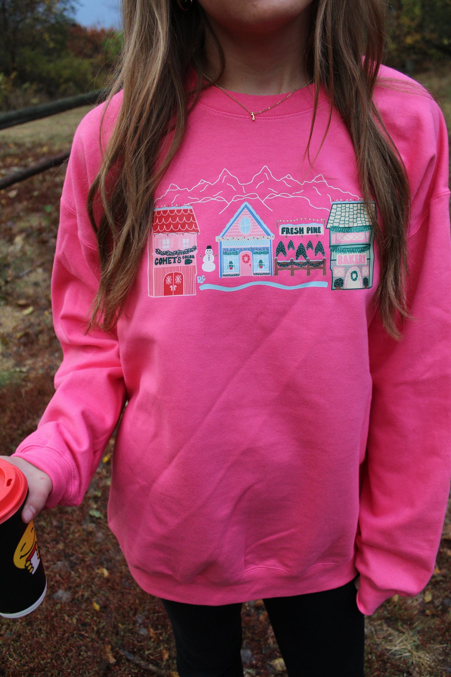 Comet's Christmas Village Sweatshirt Pink